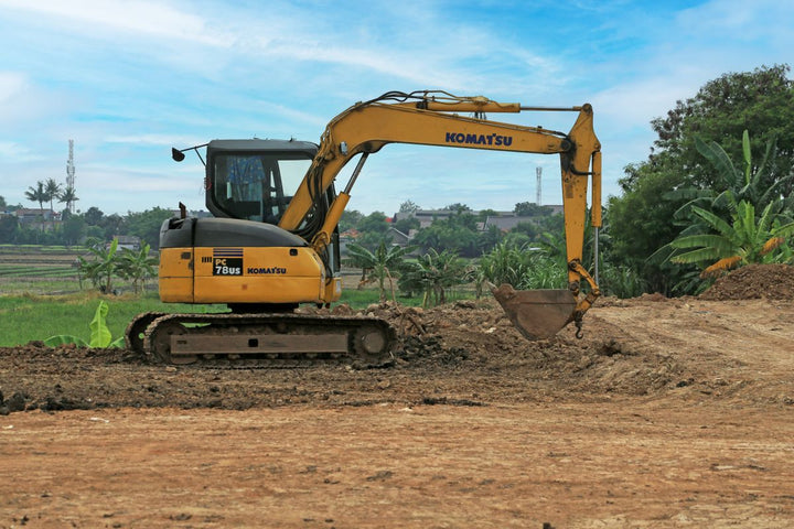 Full-size excavator working on a construction site